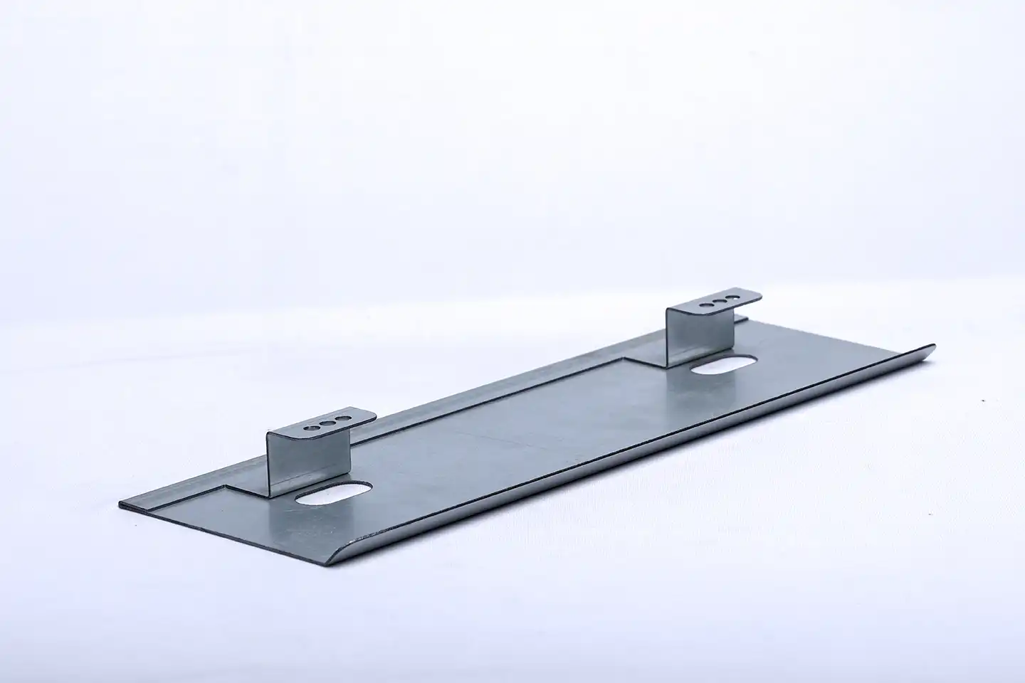 Multiple perforated metal plates stacked
