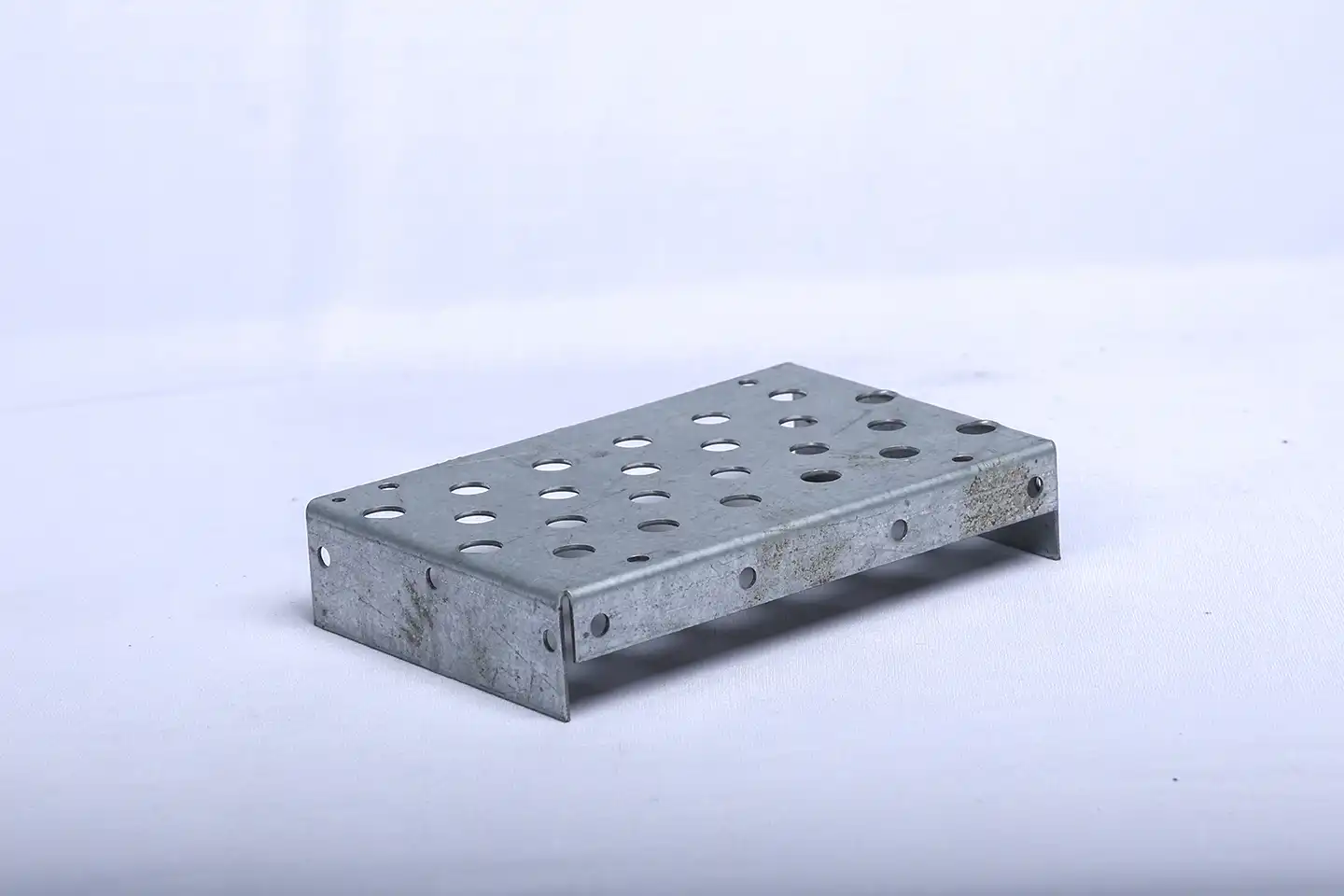Perforated galvanized steel bracket detail view
